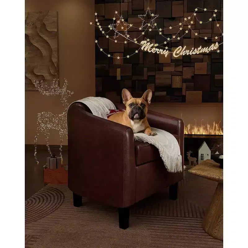 Fauteuil de salon en similicuir, avec coussin moelleux.