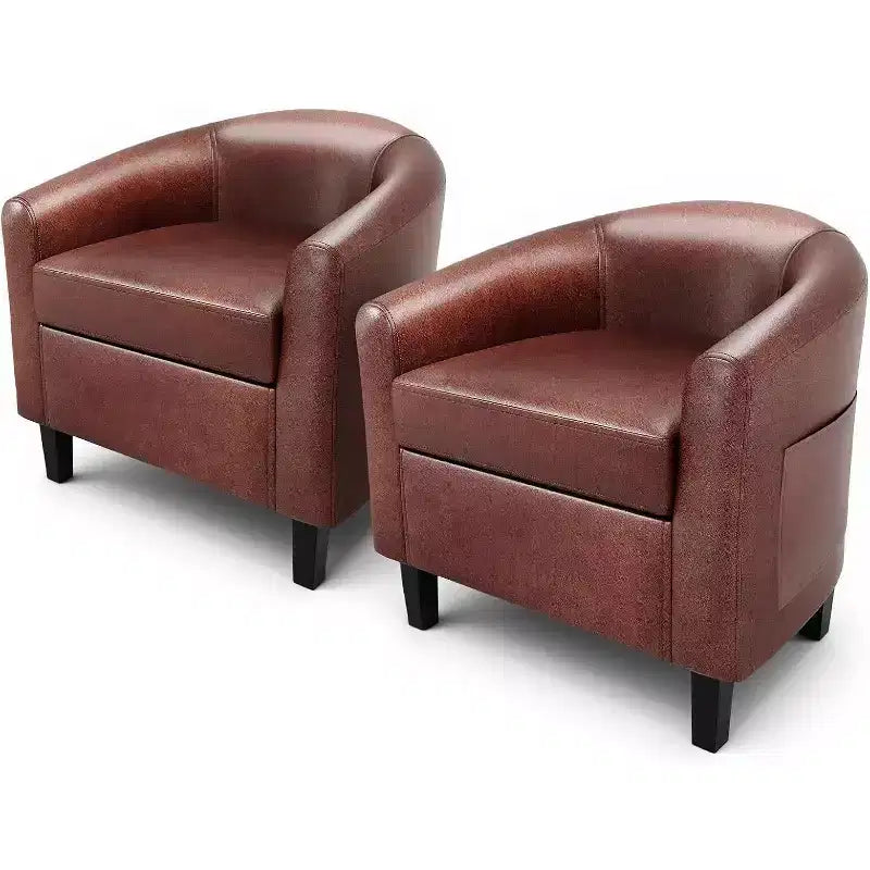 Fauteuil de salon en similicuir, avec coussin moelleux.